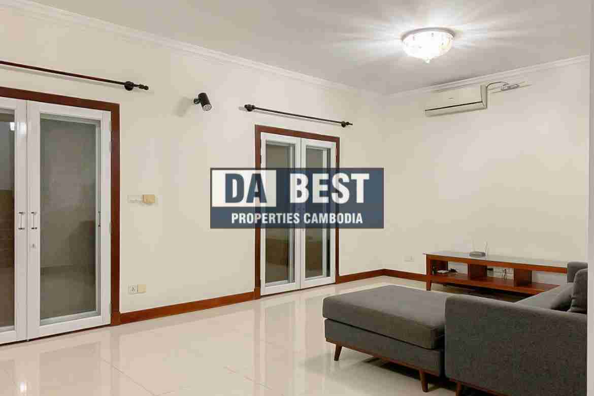 4 bedroom family villa for long term rent with shared swimming pool in siem reap dining table and sofa
