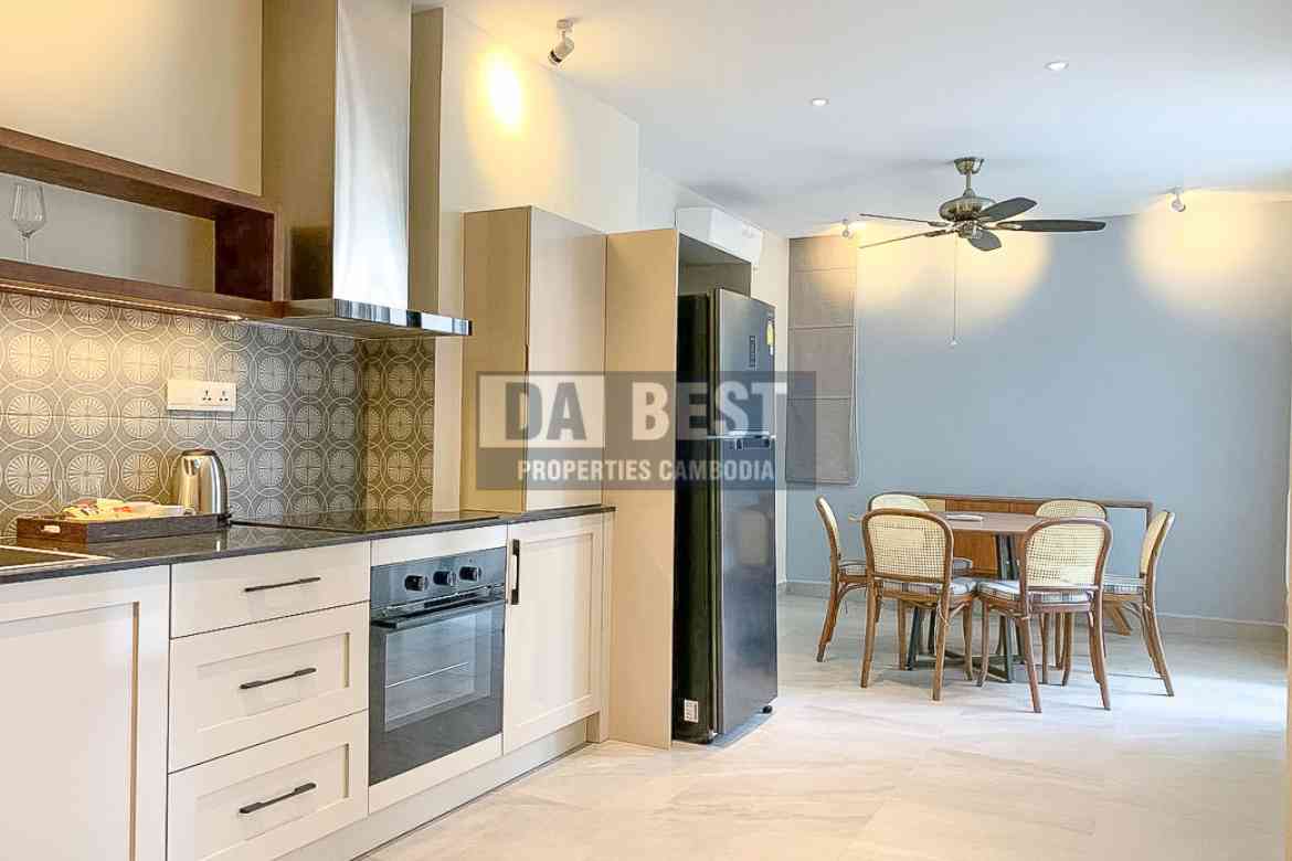 Modern Condo 1 Bedroom For Sale in Krong Siem Reap at Angkor Grace Resort - kitchen with oven and dinging table
