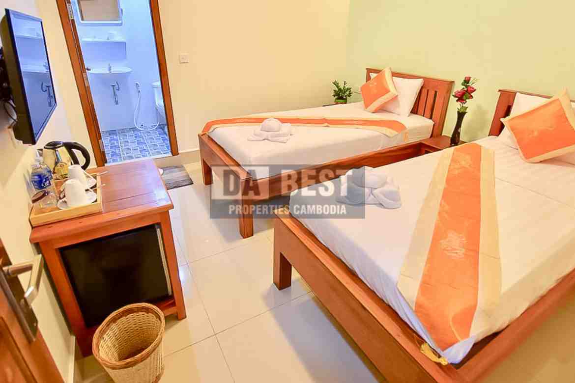 Hotel 42 room for sale in siem reap-svay dangkum-bedroom bedroom twin bed with ensuite bathroom