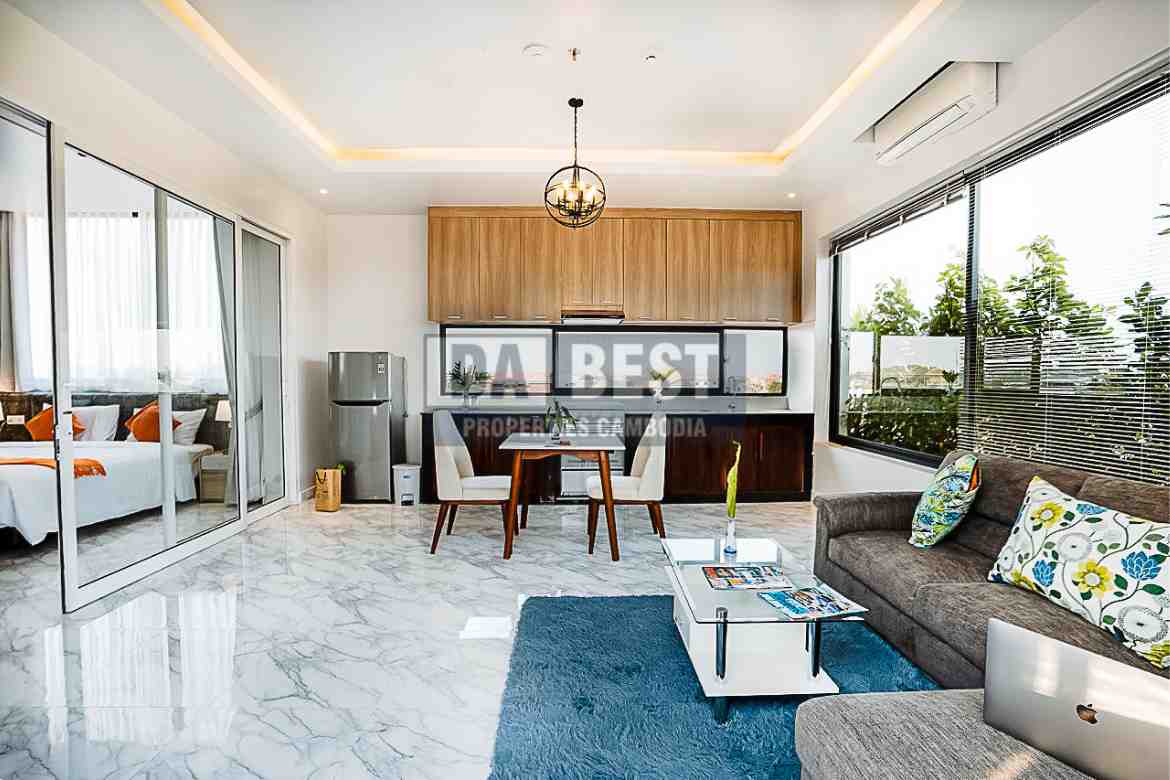 Central 1 Bedroom Serviced Apartment On The Rooftop Private Garden For Rent In Siem Reap With Modern Living Room, Kitchen And Swimming Pool - Living area