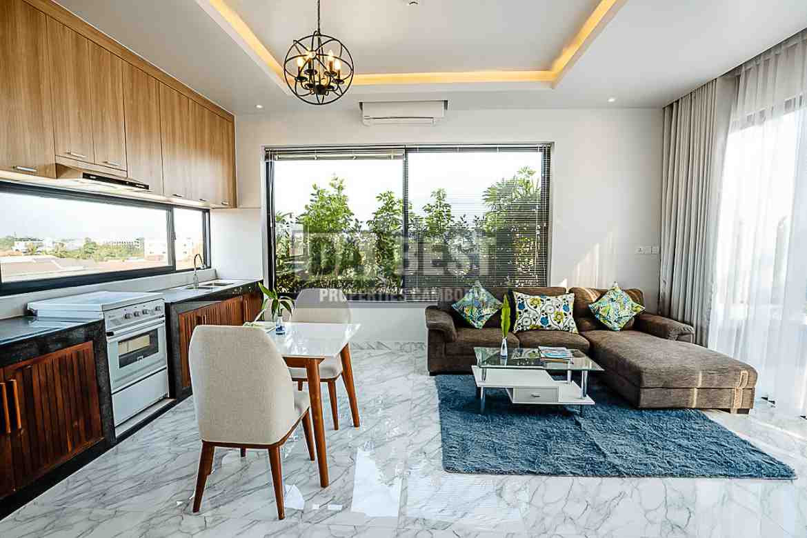 Central 1 Bedroom Serviced Apartment On The Rooftop Private Garden For Rent In Siem Reap With Modern Living Room, Kitchen And Swimming Pool - Living room
